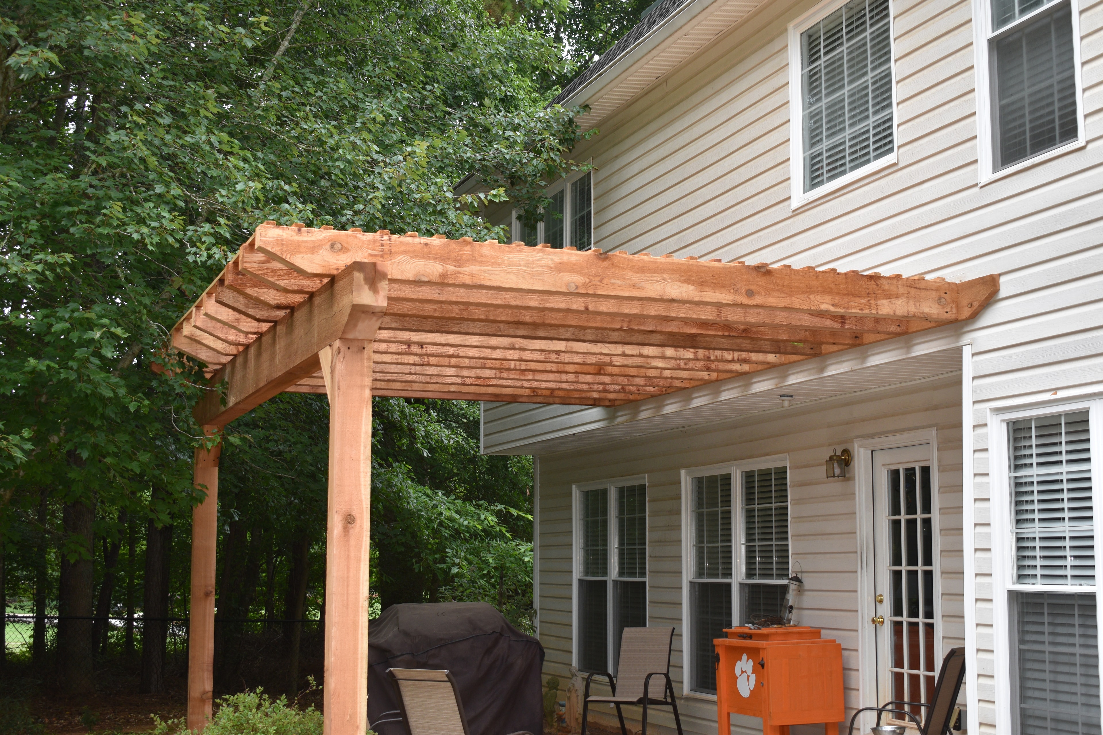 Custom pergola build attached to home patio — Loganville, GA