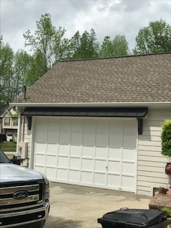 Garage siding installation — white vinyl siding, metro Atlanta, GA