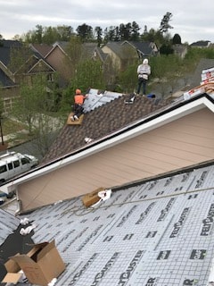 Westbrook crew installing shingles on residential roof — metro Atlanta, GA