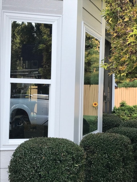New windows installed on white house exterior corner