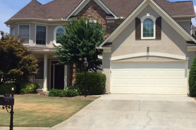 New architectural shingle roof on suburban home