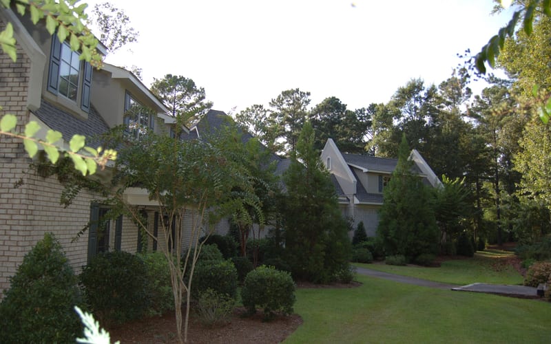 Completed roof replacement on large suburban home